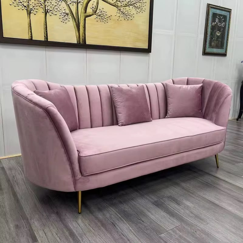 . Tailored petal-back velvet couch for salons and commercial interiors, fully customizable in finish and size
