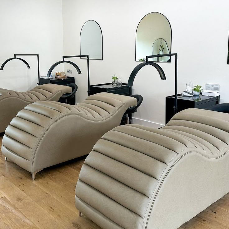 ROMA lash and brow treatment bed in luxury studio setup with sculpted ergonomic design