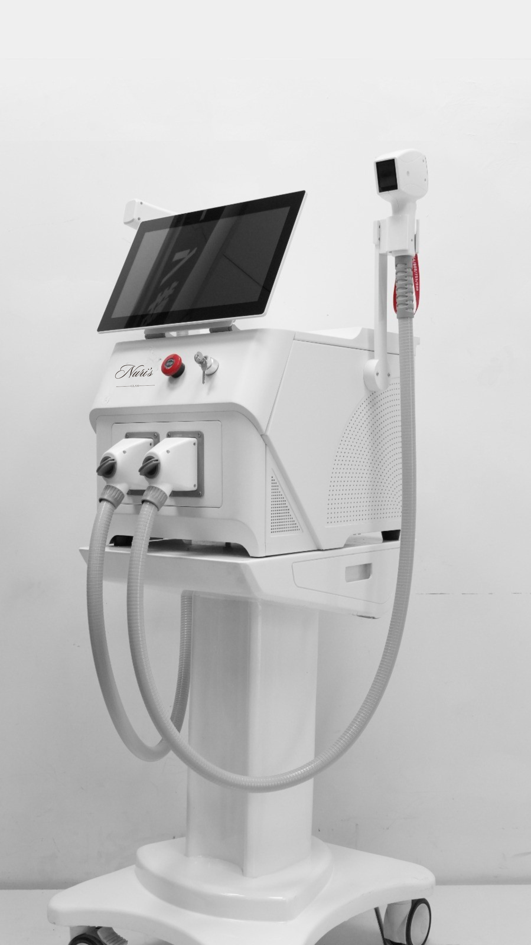 Aesthetician using 2-in-1 diode and Nd:YAG laser on client in modern skincare clinic